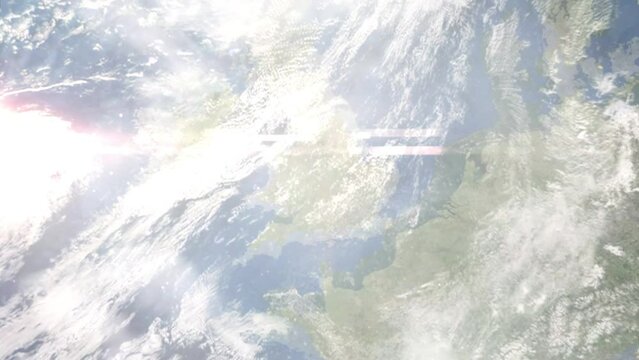Earth zoom in from outer space to city. Zooming on Solihull, UK. The animation continues by zoom out through clouds and atmosphere into space. Images from NASA