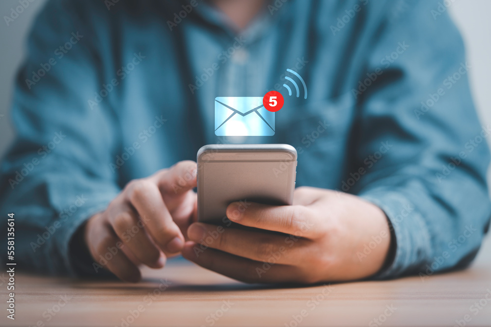 Poster businessman using smartphone and touching with virtual white newsletter for electronic mail or e-mai