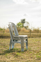 Blue Plastic Chairs on Grass