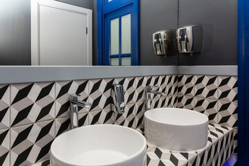 Naklejka na ściany i meble Interior of bathroom with sink basin faucet.