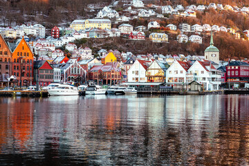 Famous Bryggen street with historical wooden colored houses. Hanseatic wharf in Bergen, Norway. UNESCO World Heritage Site.