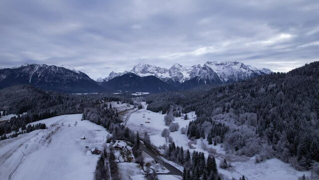 DRONE AERIAL FOOTAGE: The Karwendel mountains, the largest mountain range of the Northern Limestone Alps, near Garmisch-Partenkirchen and Mittenwald, Krun, Bavaria, Germany.