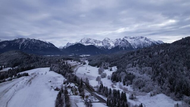 DRONE AERIAL FOOTAGE: The Karwendel mountains, the largest mountain range of the Northern Limestone Alps, near Garmisch-Partenkirchen and Mittenwald, Krun, Bavaria, Germany.