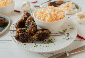 Cevapcici, serbian meatballs with delicious coleslaw