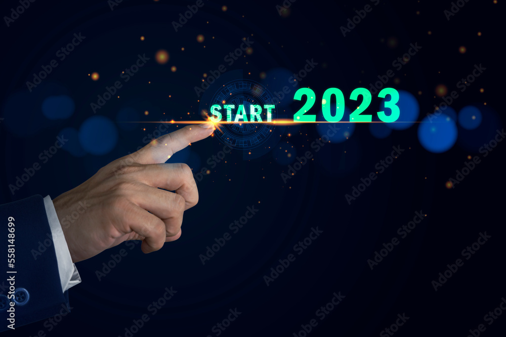 Aufkleber in 2023, pointing at a computerized user interface, up until 2023, there are plans to speed up corpo