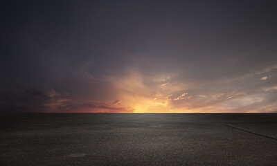 Dark Floor Background with Sunset Clouds Night Sky Horizon - 558149243