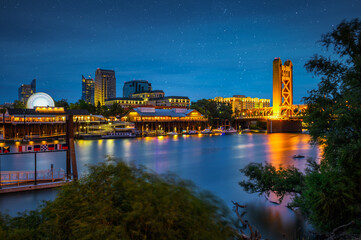Tower Bridge and Sacramento River in Sacramento, California, captured at night