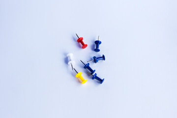 push pins for Notice Boards in Reusable red, blue, and yellow color isolated. white background.