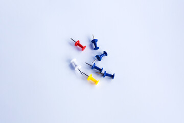 push pins for Notice Boards in Reusable red, blue, and yellow color isolated. white background.