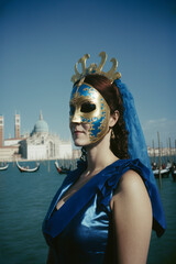 Fototapeta na wymiar Beautiful young woman prepares for carnival, mysterious look, Venetian mask. Created with Generative AI technology.