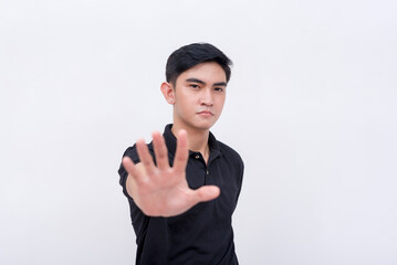 An irked or demanding man commands to stop, putting his hand forward. Isolated on a white...