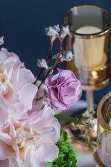 Beautiful flowers. Preserved roses with dried flowers bouquet closeup. Beautiful flower arrangement in a pink box.
