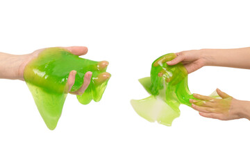 Green slime toy in woman hand isolated on white background.