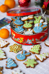 Ginger cookies in shape of rabbits,Christmas trees and snowflakes  with sugar icing - light blue, green, white.