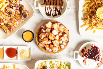View from above of several seafood dishes. High quality photo