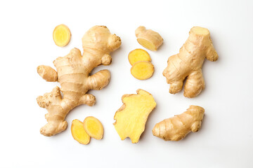 Fresh ginger on white background, flat lay