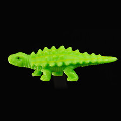 Ankylosaurus toy closeup on black background