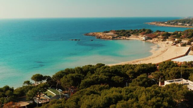 beautiful beach with crystal blue water and pine forest in Italy, Salento, Puglia, Lido Silvana, fata  morgana, Pulsano 