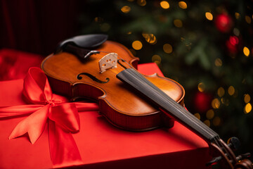 Retro musical instrument violin as a gift for the new year.