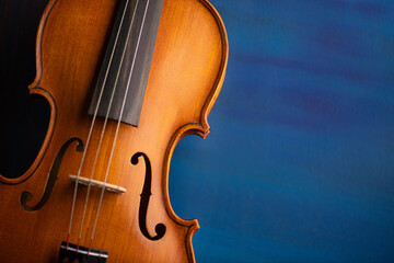 Vintage violin on abstract art colored background. - 558166422