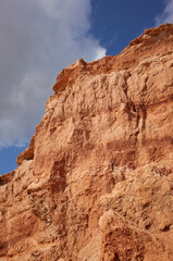 Fototapeta premium Ibiza, Spain - August 27, 2022 : View of Sa Caleta beach rocks