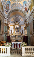Main nave and presbytery of Our Lady Assumption church, Notre Dame de l’Assomption in historic old town of Eze on Azure Cost of Mediterranean Sea in France