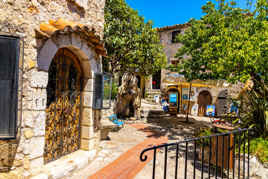 Fototapeta Historic streets and stone houses in medieval town of Eze on French Riviera Coast of Mediterranean Sea in France