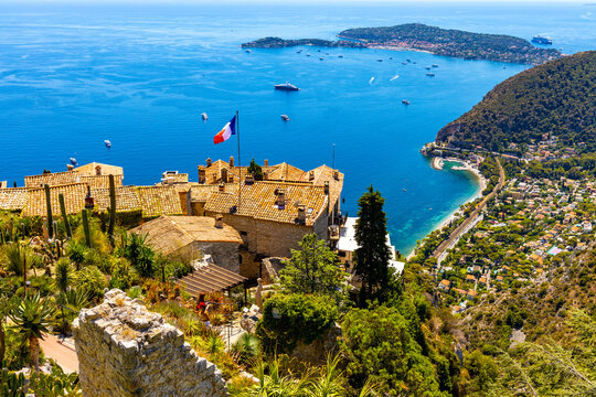 Panoramic view of Eze Bord de Mer, Silva Maris port and St. Jean Cap Ferrat cape seen from historic town of Eze over Azure Cost of Mediterranean Sea in France