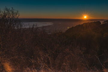 Panoramic sunset high above the sea.