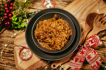 Homemade sauerkraut stew with mushrooms. Traditional Polish bigos.