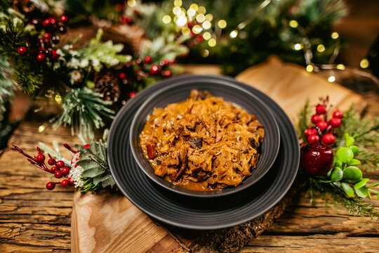 Homemade sauerkraut stew with mushrooms. Traditional Polish bigos.