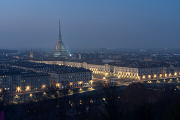 Fototapeta na wymiar Turin city centre with the landmark Mole Antonelliana at night, Piedmont, Italy