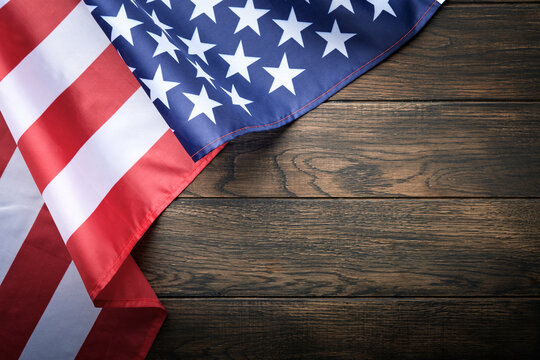 American flag on old wooden background with copy space. Close Up for Memorial Day or 4th of July or Happy Martin Luther King jr day. Top view. Copy space. Mock up.
