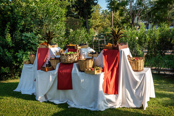 A table set for a summer garden party with various fruits