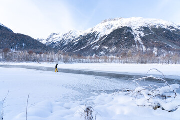 winter landscape with mountains and snow and frozen lake