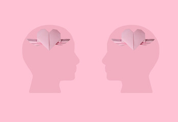 2 pink heads with hearts instead of brains, creative holiday design
