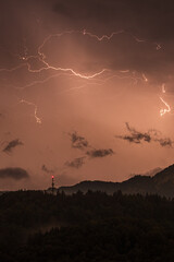 A summer thunderstorm over a radio tower