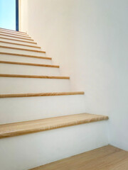 pattern of white stairs with brown wood 