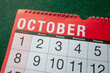 Calendar 2023, October, monthly planner for wall and desk. Close up of month and fist few days.