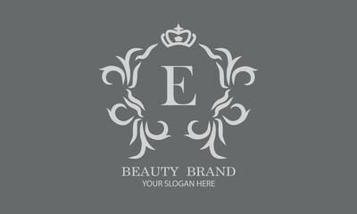 Luxury initial E logo template for restaurant, royalty, boutique, cafe, hotel, heraldic, jewelry, fashion and other vector illustrations