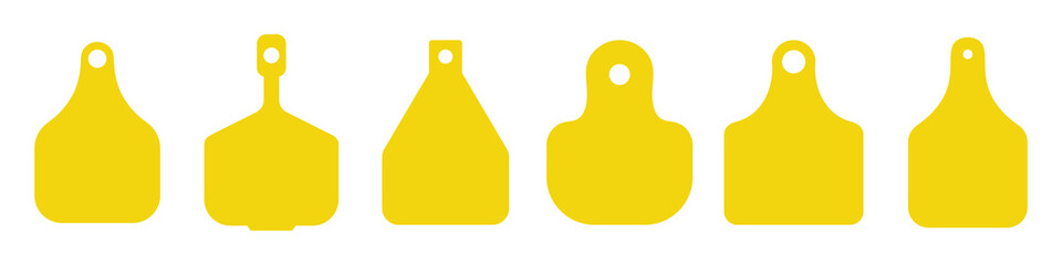 Set of vector ear tags for domestic animals. Cow, cattle yellow ear tags.