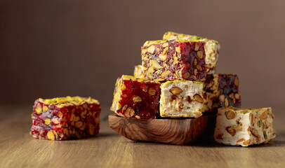 Traditional Turkish delight  on a wooden table.
