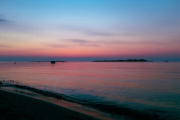 sunrise on the beach - 558190095