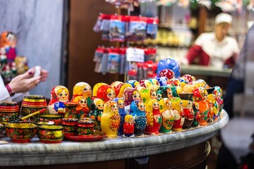 Colorful Russian nesting dolls matreshka at the market. Matrioshka are the most popular souvenirs from Russia