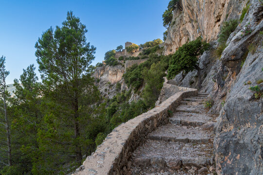 Ancient stone steps hewn into mountain leading to Castell Alaro on island of Mallorca/Majorca
