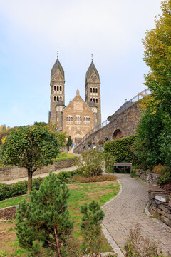 Clervaux, Luxembourg - October 3, 2022: Cityscape with roman catolic church Saints-Come-Et-Damien of Clervaux in Luxembourg