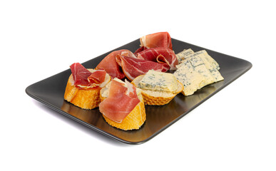 Prosciutto Tapas and Mold Cheese on Black Plate, Spanish Jamon Slices, Parma Ham, Sliced Serrano, Iberico