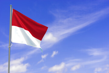 Republic of Indonesia Flag Over Blue Sky Background. 3D Illustration