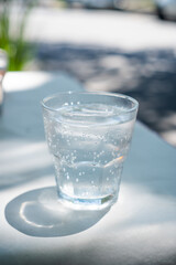 glass of soda on a white table