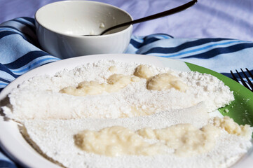 tapioca with coconut filling next to bowl